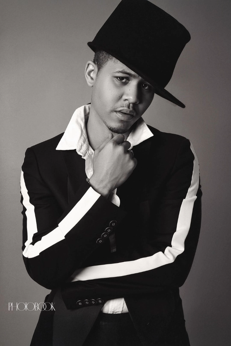 Actor Rhenzy Feliz in custom formal wear with top hat