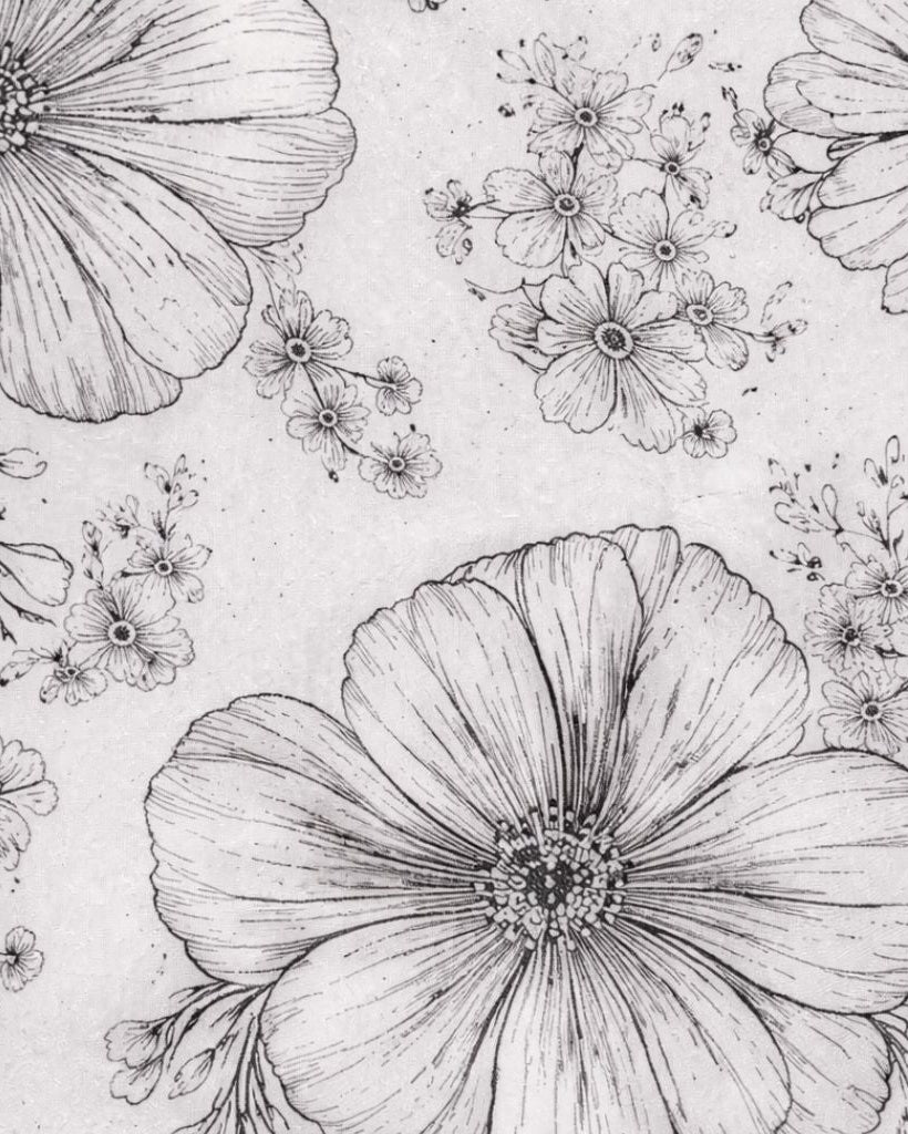 Detailed close-up of a delicate black and white floral pattern with intricate linework and shading, highlighting the elegant fabric design of the Brunello Cucinelli White Floral Graphic Tuxedo Jacket.