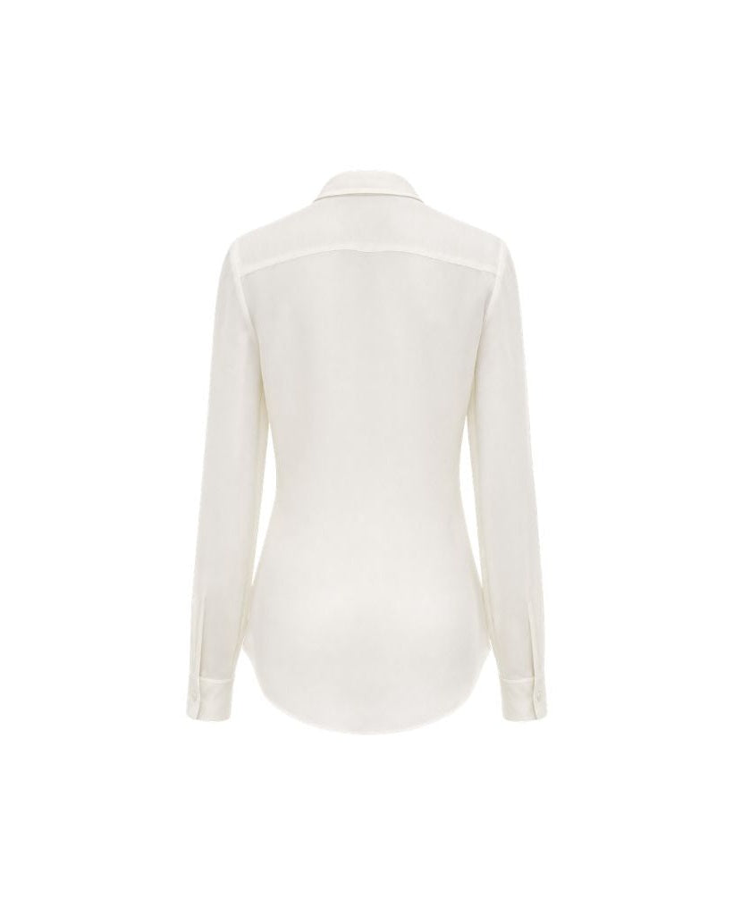 Back view of Ivory Semi-Sheer Tailored Shirt crafted with lightweight fabric, featuring a feminine fitted shape, long sleeves with buttoned cuffs, and a classic collar for elegant layering.