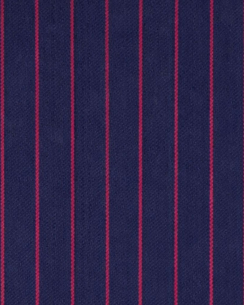 Close-up of the Navy Red Pinstripe Oversized Blazer fabric, highlighting vertical red pinstripes on a deep navy textured background for a refined and classic suiting look.
