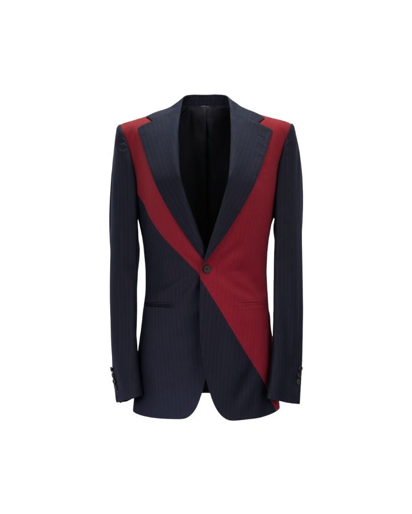 Front view of Navy and Red Pinstripe Graphic Jacket featuring a sharp single-button closure, an asymmetric red graphic overlay on classic navy pinstripe fabric, and tailored lapels for a bold, contemporary silhouette.