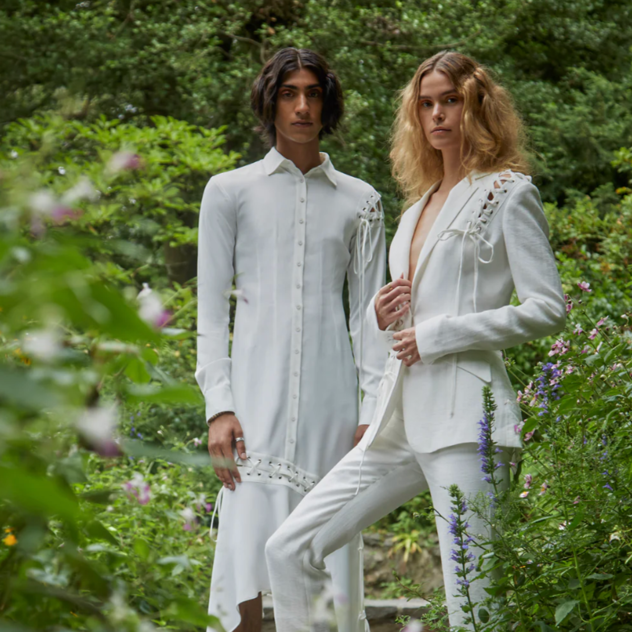 Tailory ivory lace-up tailored blazer styled in garden campaign with coordinated white tailoring