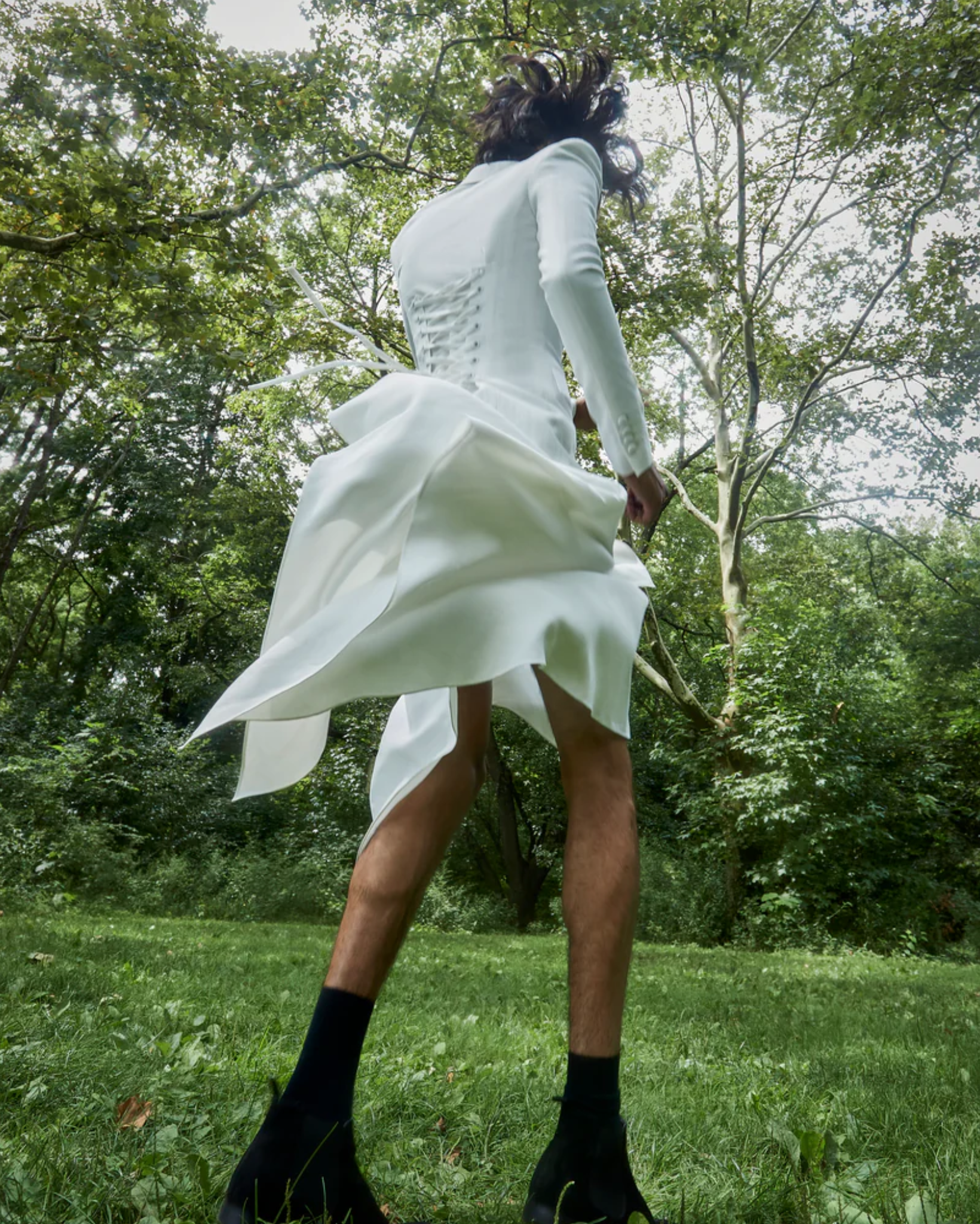 Tailory ivory wool maxi wrap coat styled outdoors with fluid drape