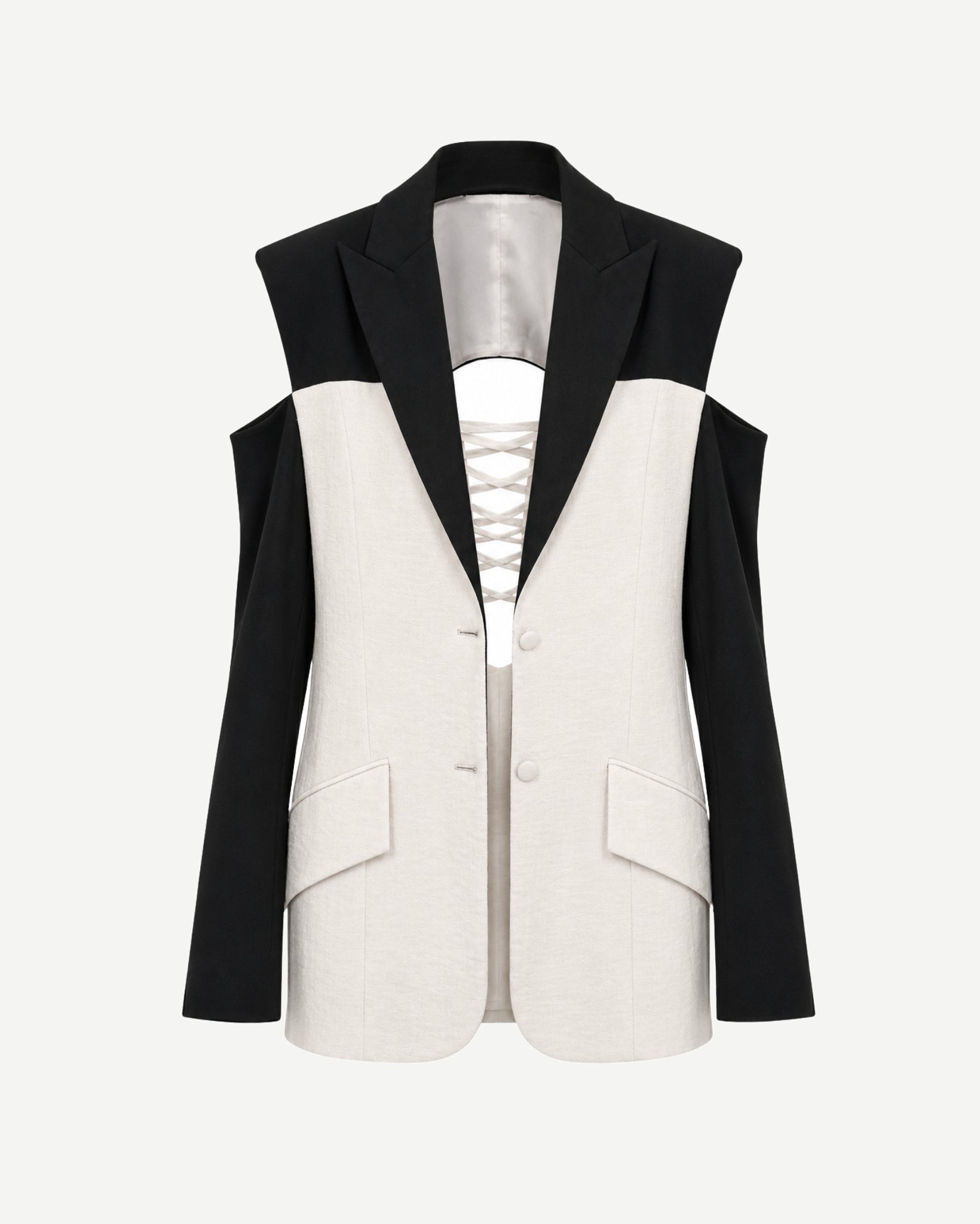 Black and white sleeveless blazer on a white background
