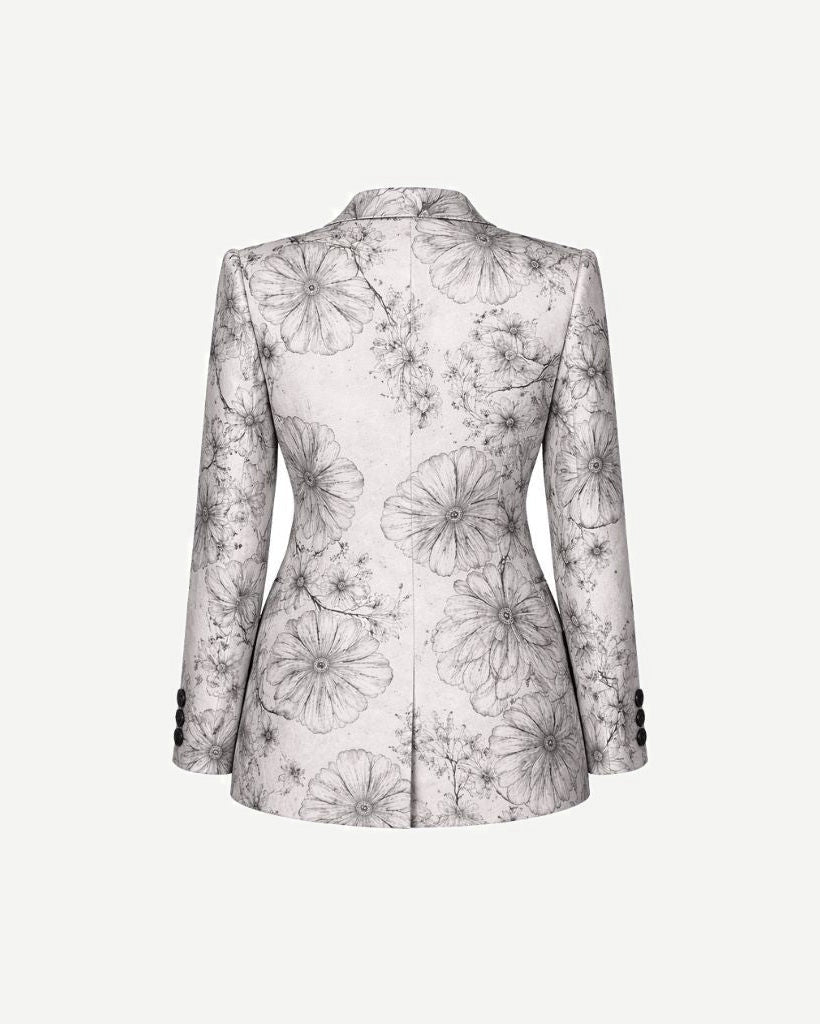 Brunello Cucinelli White Floral Graphic Jacket shown from the back, featuring an elegant monochrome floral pattern on a tailored silhouette with structured shoulders and buttoned cuffs.
