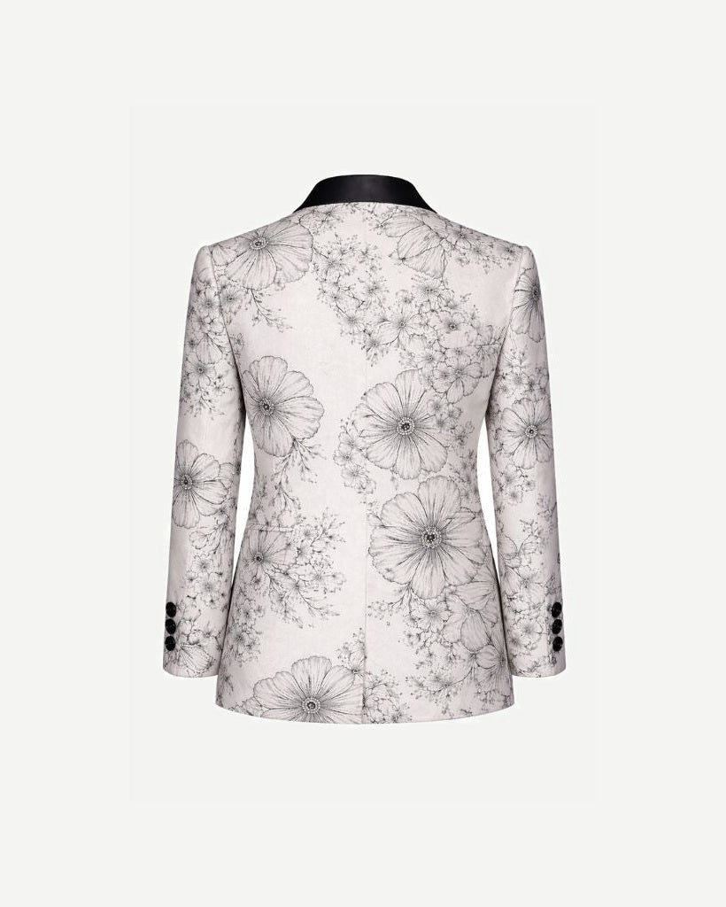 Back view of Brunello Cucinelli White Floral Graphic Tuxedo Jacket showcasing a tailored fit with delicate black floral sketches on white fabric and contrasting black satin collar.