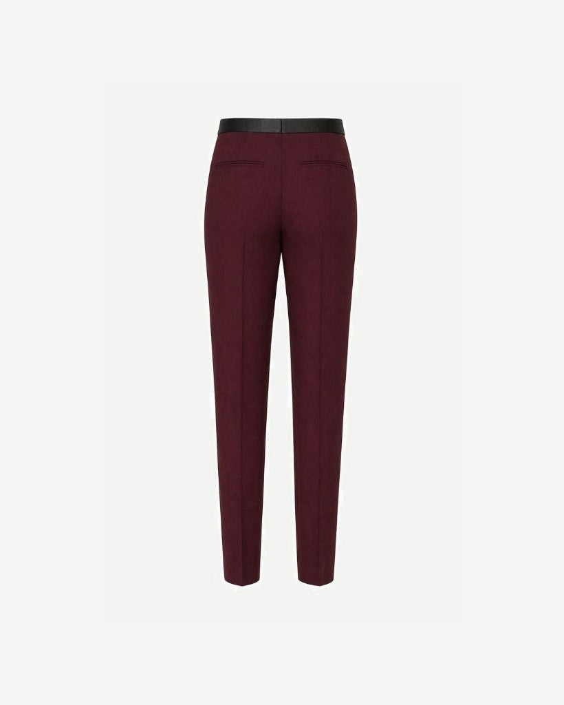 Back view of Burgundy Wool Tuxedo Trousers — Slim Tapered Fit with Satin Waistband, crafted from rich wool fabric in deep burgundy showcasing a sleek tailored silhouette.