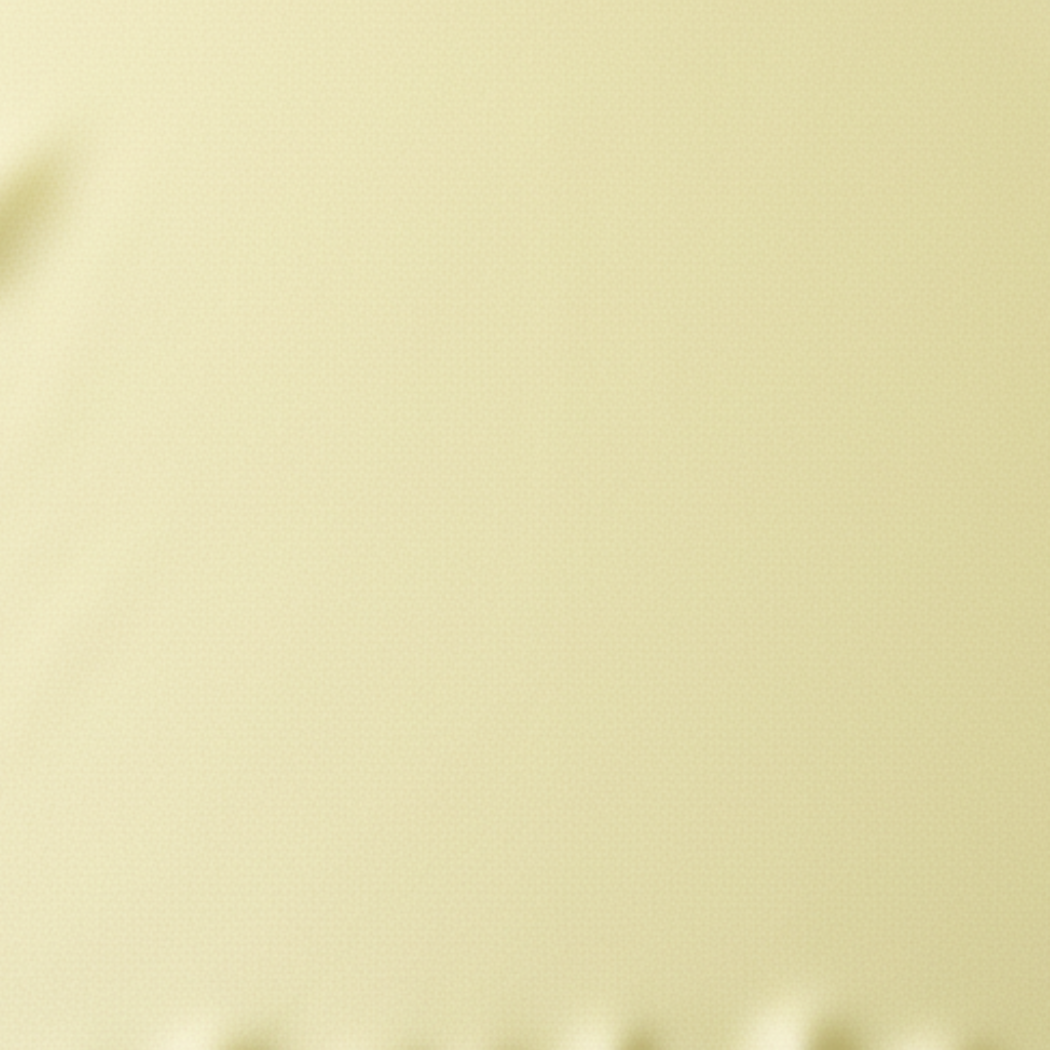 Close-up swatch of yellow satin fabric used for the cami tank top