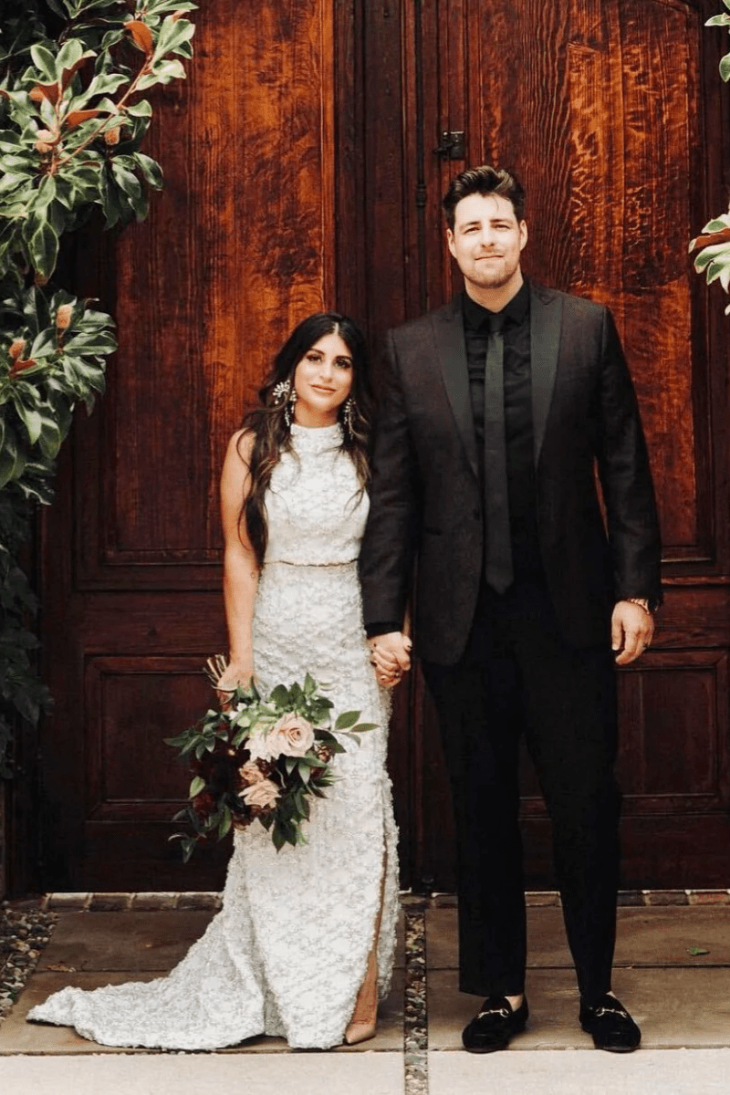 Bride and groom in custom wedding couture