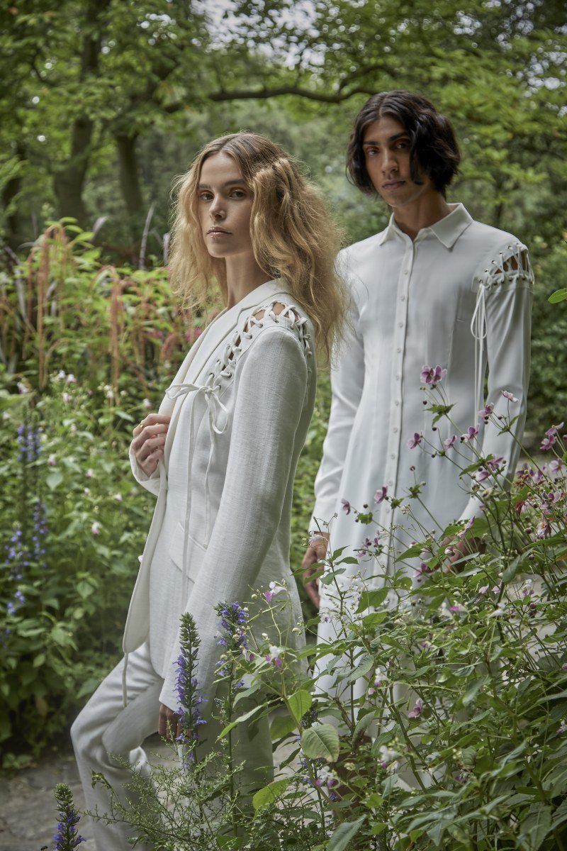 Models wearing all white ensembles from The Tailory New York