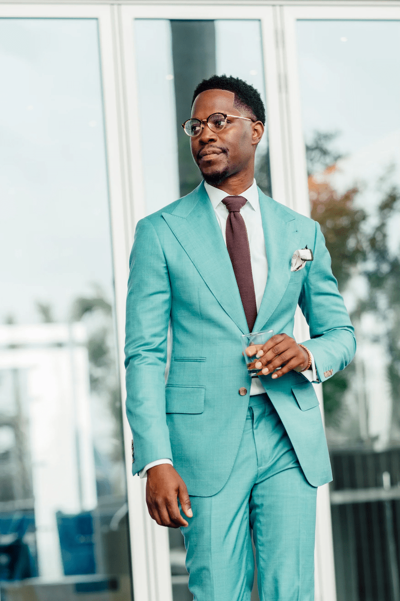A custom tailored teal suit