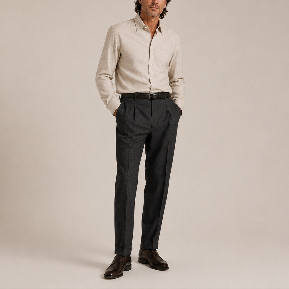 Man wearing navy blazer and grey trousers