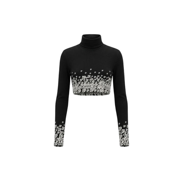 The Tailory New York X Dogpound Cropped Mockneck in black with a white "DP" logo gradient pattern concentrated at the midsection and sleeve ends, featuring long sleeves and a fitted silhouette.