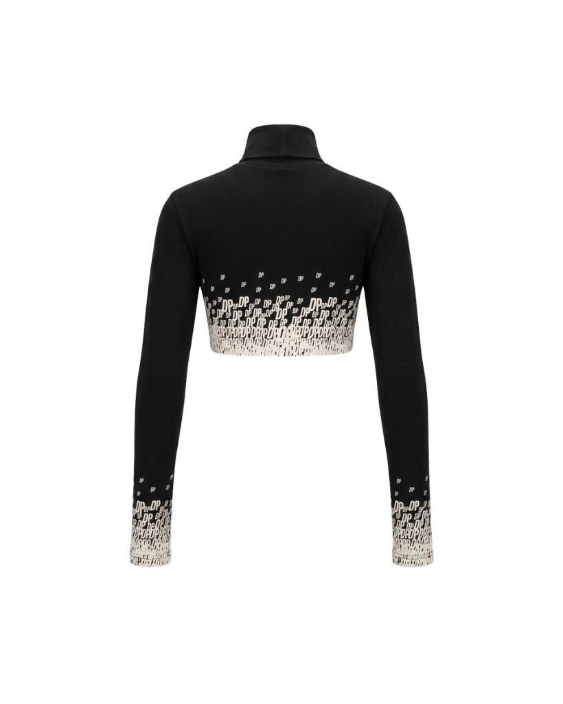The Tailory New York X Dogpound Cropped Mockneck in black showcases a fitted long-sleeve design with a high collar and an intricate white "DP" logo pattern gradually emerging from the hem and sleeve ends.
