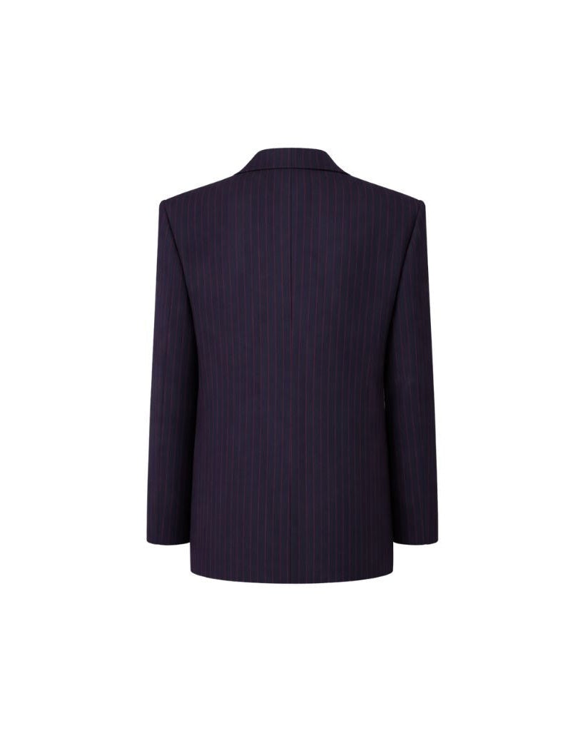 Back view of the Navy Red Pinstripe Oversized Blazer, highlighting its relaxed fit, long sleeves, and vertical red pinstripes on a deep navy fabric for a bold yet sophisticated style.