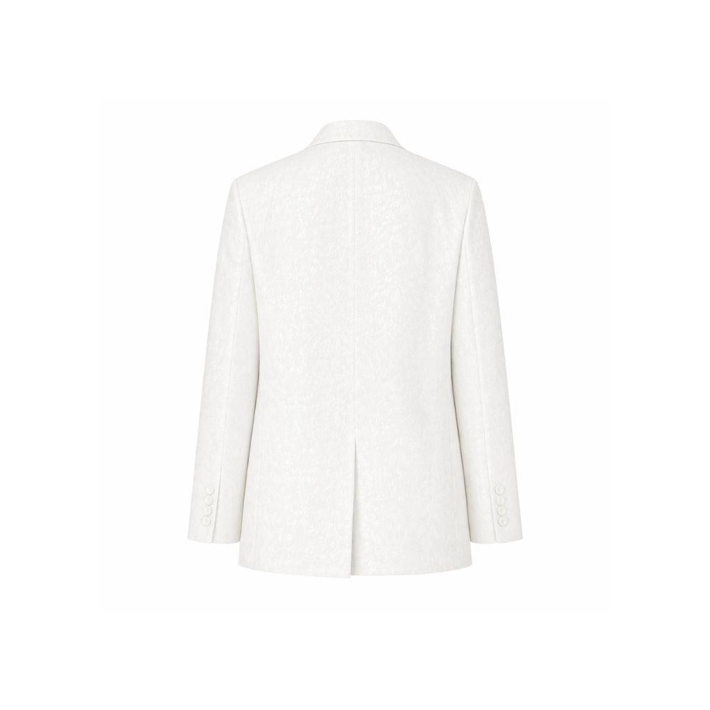 Back view of the White Jacquard Tuxedo Blazer featuring a subtle jacquard pattern in white fabric, tailored with a modern fit and rear vent for refined formal wear.