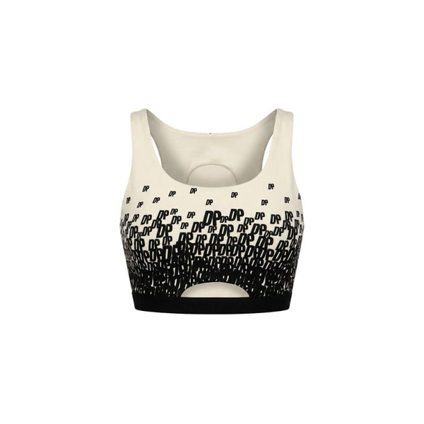 The Tailory New York X Dogpound Cropped Yoga Top in ivory featuring a sleeveless design with a bold black "DP" logo pattern fading upward and a supportive elastic band at the hem.