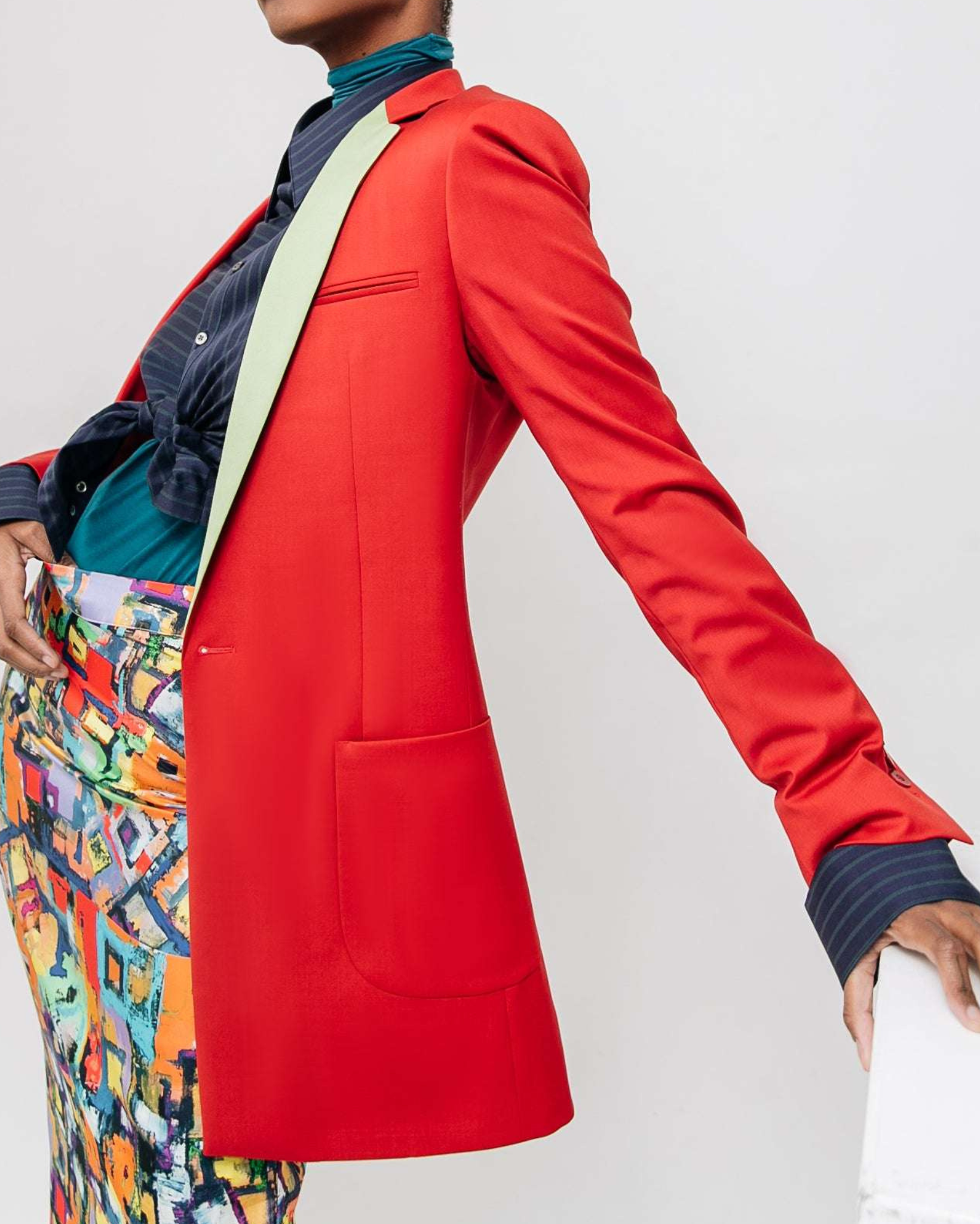 Tailory ruby red contrast lapel blazer on model standing