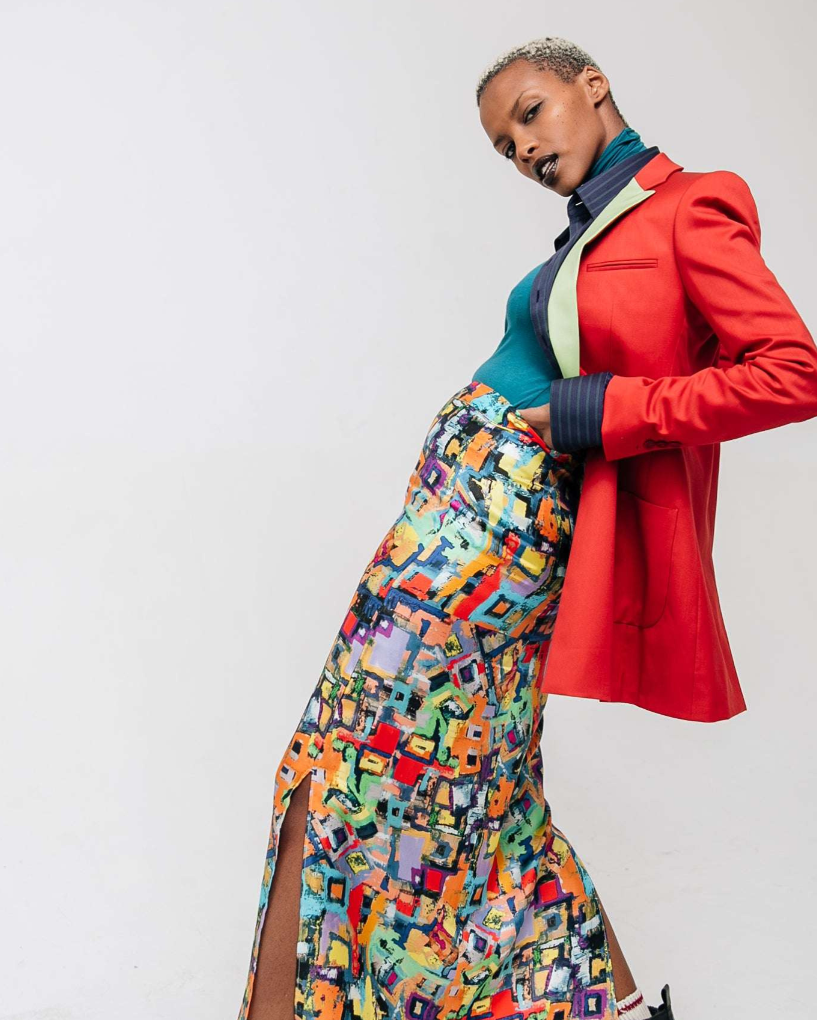Tailory ruby red contrast lapel blazer on model walking