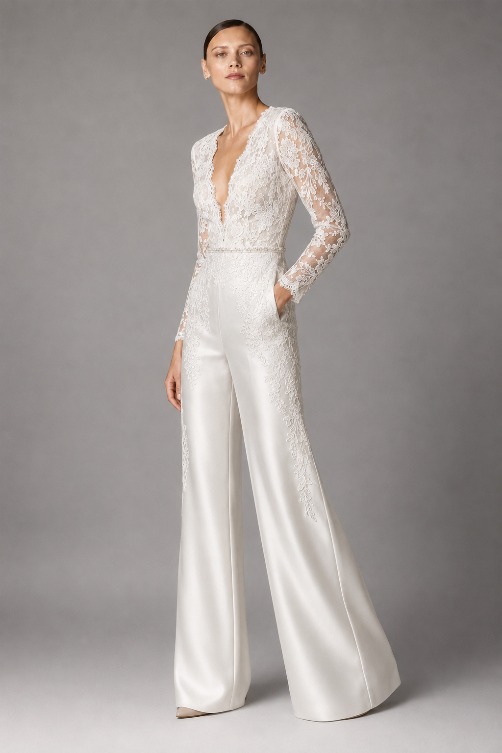Embellished white jumpsuit with wide leg pants