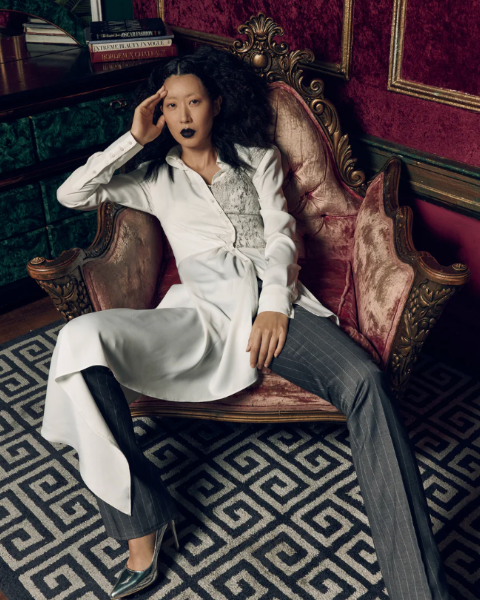 Tailory ivory asymmetric draped shirt lifestyle view featuring metallic corset detail and dramatic draped hem