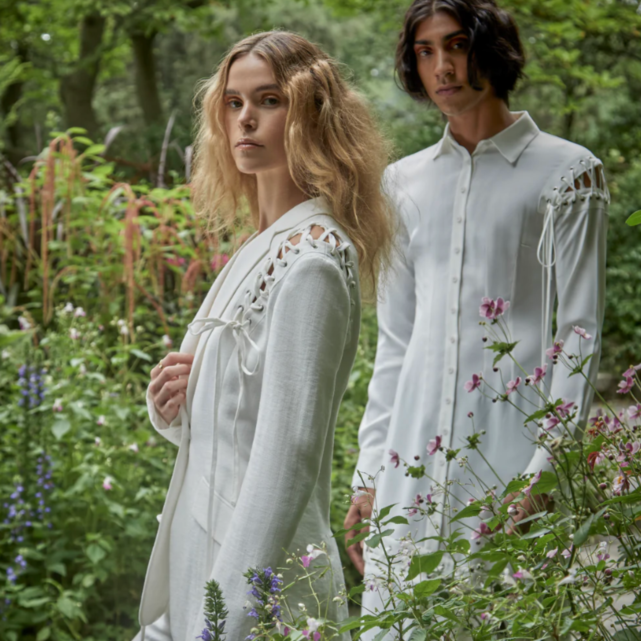 Tailory ivory lace-up tailored blazer lifestyle view showing shoulder lace-up detail and fitted styling