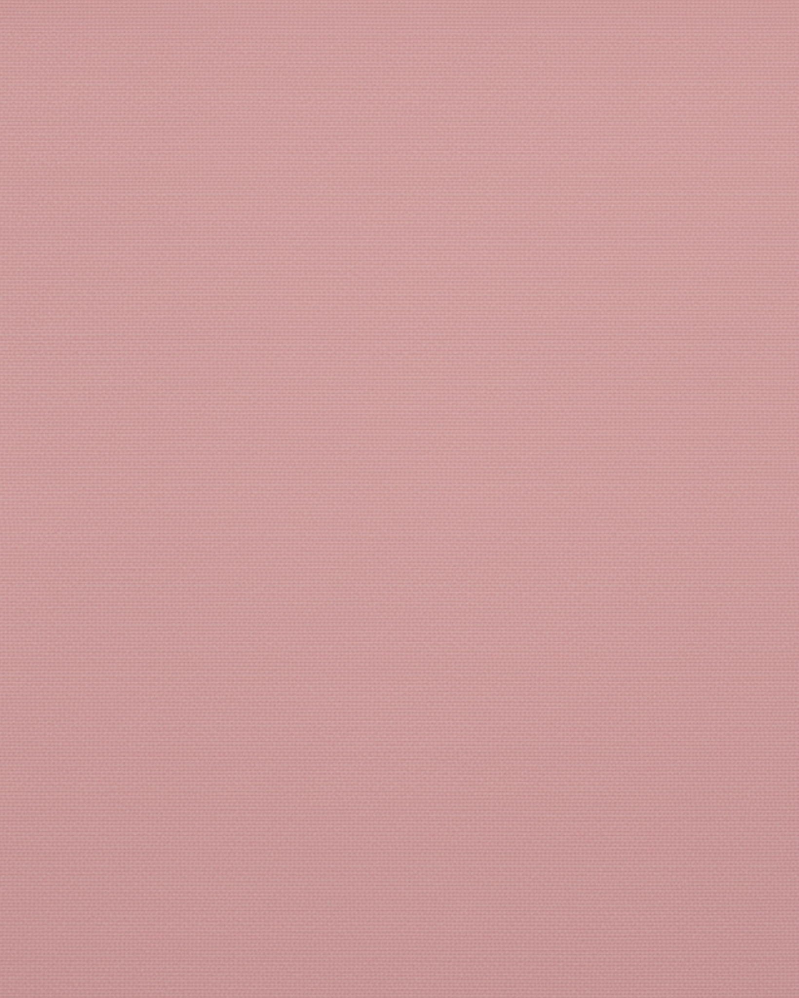 Smooth blush pink fabric swatch highlighting a soft, finely woven texture in a muted tone, showcasing the material used for the Blush Pink Color-Block Wide-Leg Shorts.