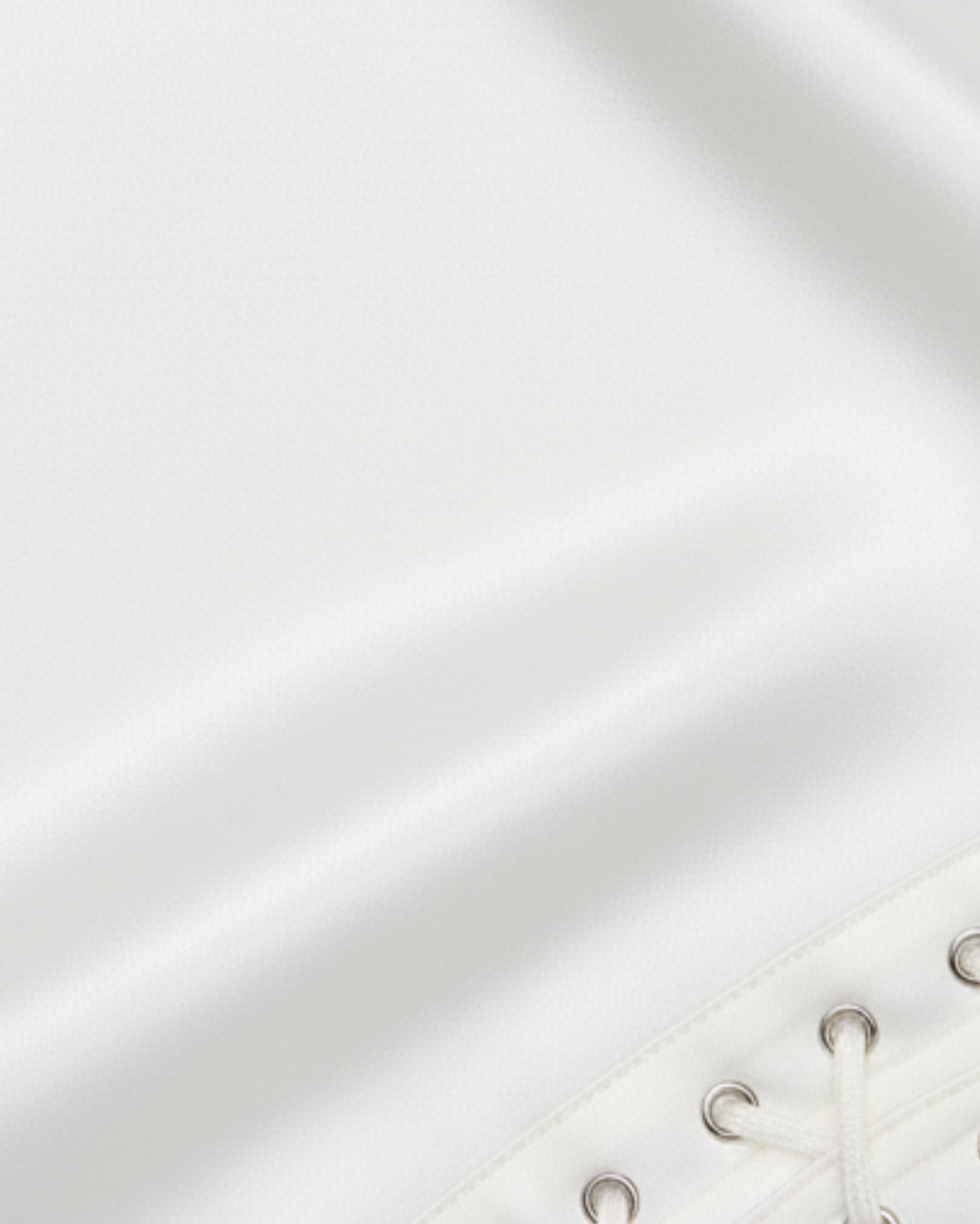 white_cutout_shirtdress_detail — Tailory white shirtdress fabric and cut-out detail close-up