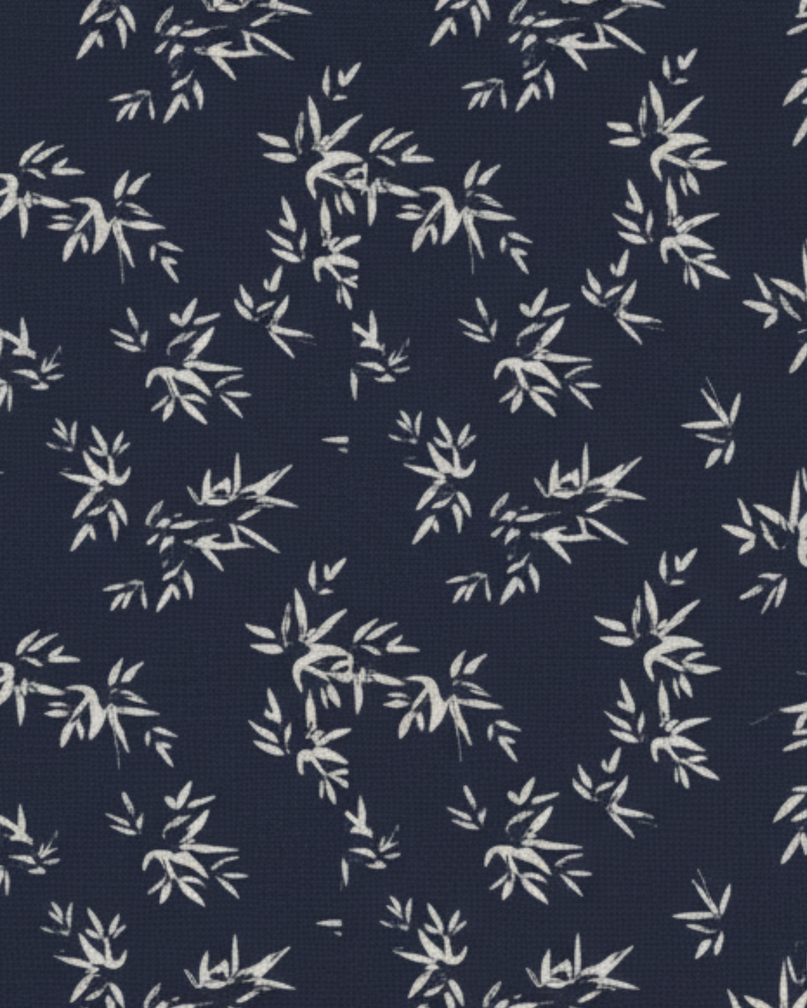 Close-up of the Navy White Palm-Print Tailored Shirt fabric featuring delicate white palm leaf motifs on a deep navy background, highlighting refined texture and intricate patterning.