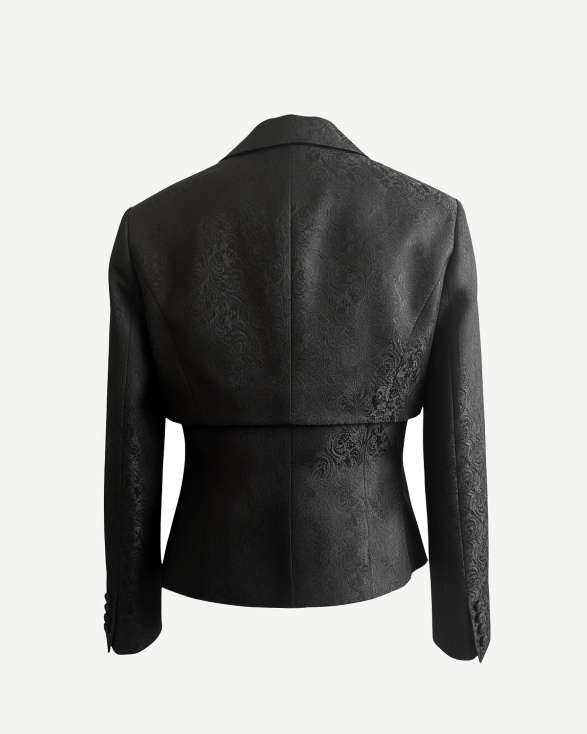 Back view of black floral brocade cropped jacket with structured bodice