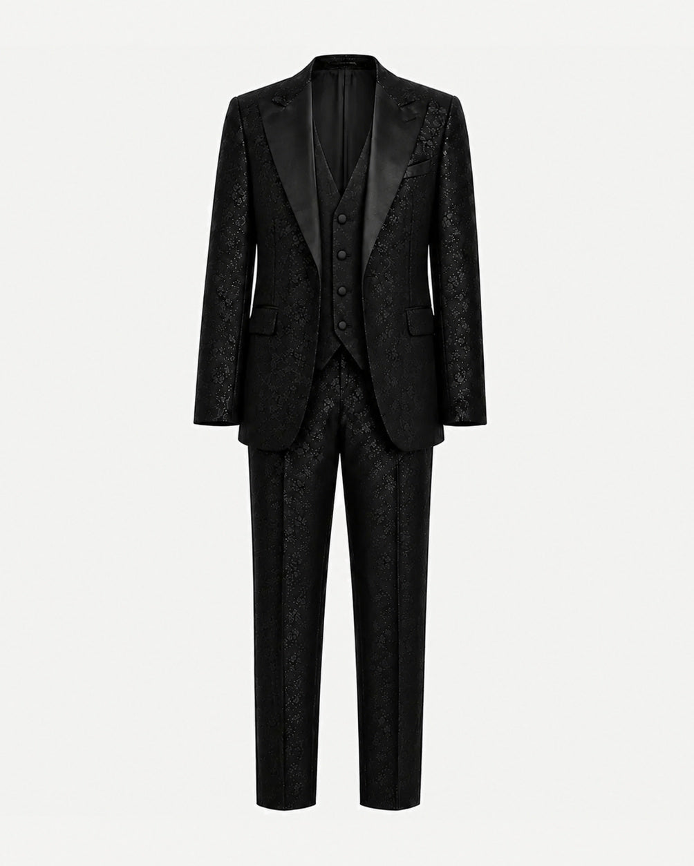 Black Floral Jacquard Three-Piece Tuxedo Suit featuring a tailored jacket with satin lapels, matching waistcoat, and slim-fit trousers crafted from intricately patterned floral jacquard fabric.