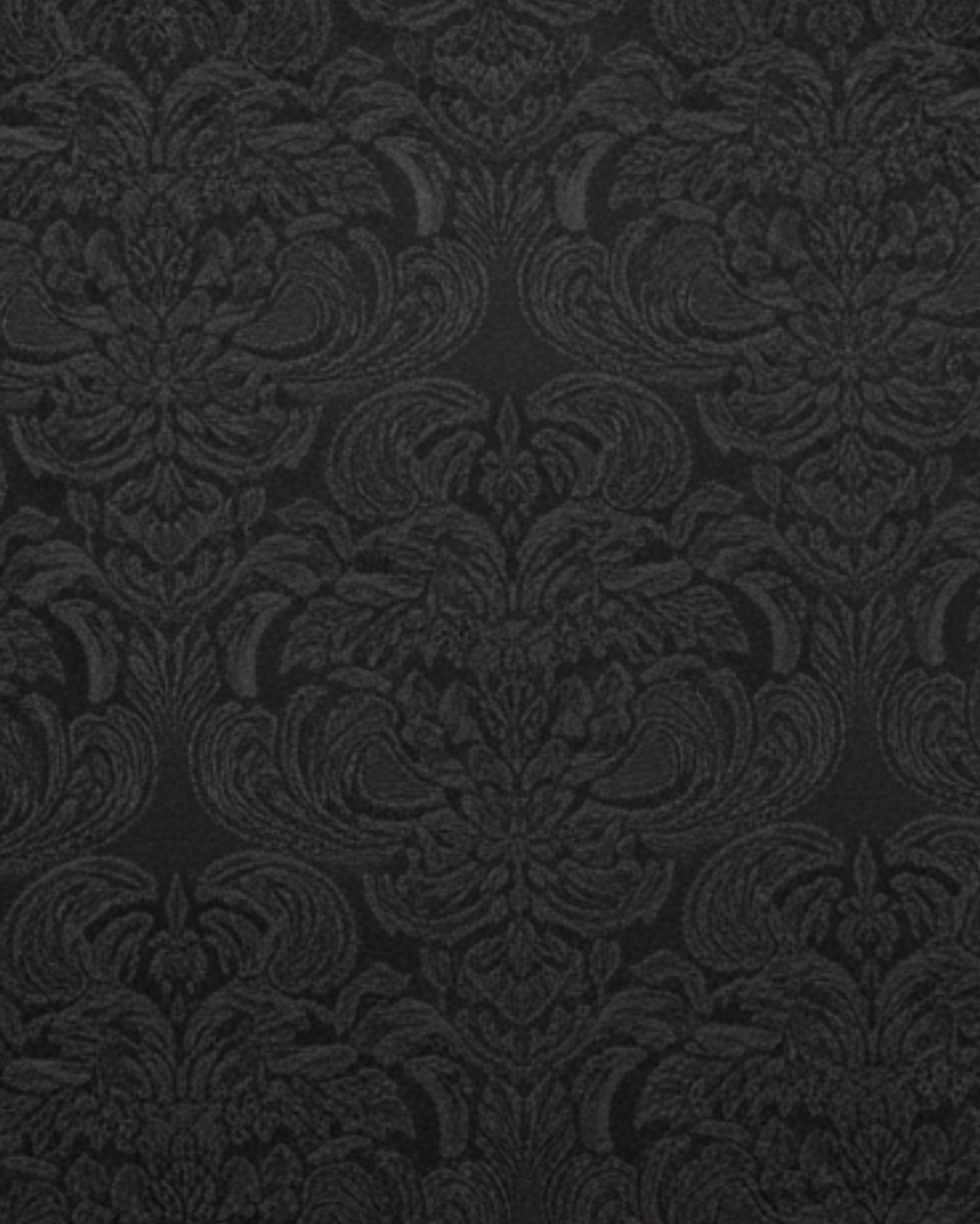 Tailory black tonal brocade fabric swatch with satin waistband detailing and straight-leg tailoring