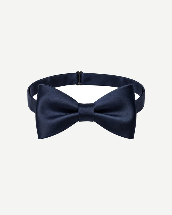 Front view of navy satin pre-tied bow tie with structured butterfly shape and adjustable neck strap