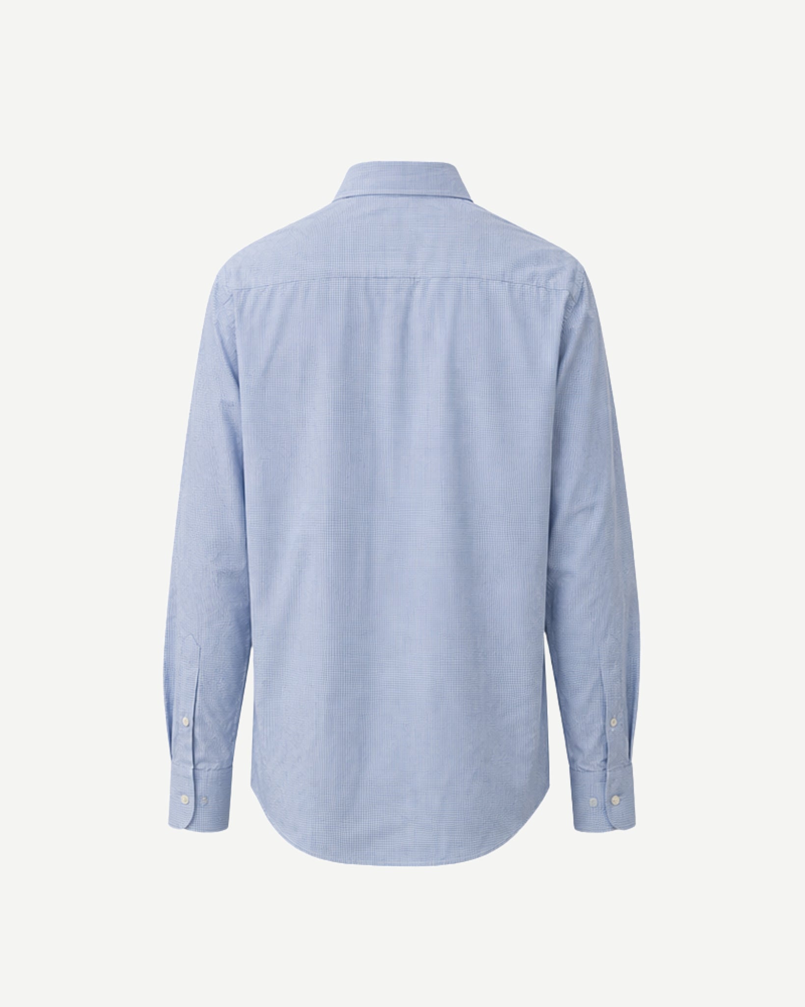 Back view of light blue micro-check shirt showing the straight back yoke and curved hem