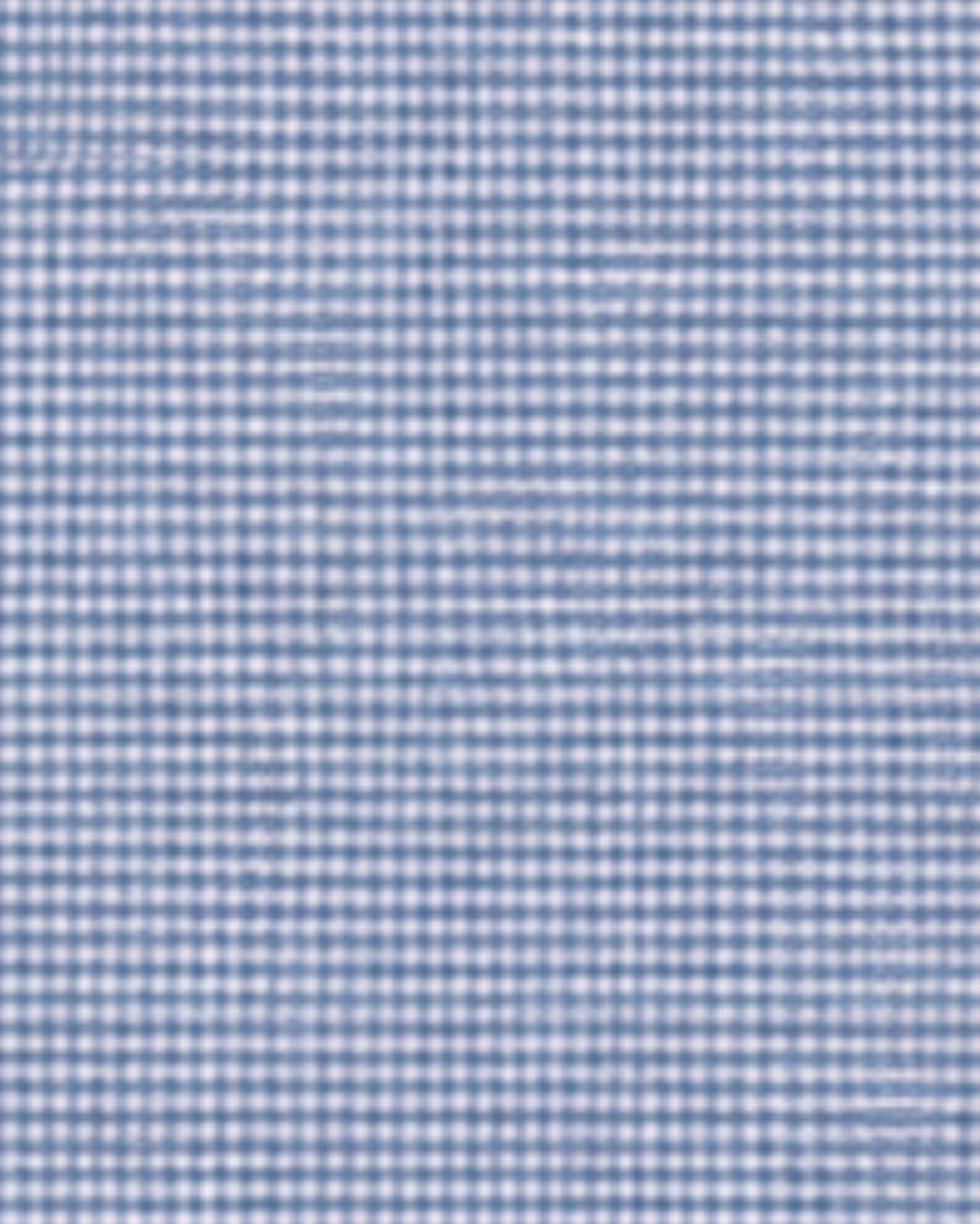 Close-up fabric swatch of light blue cotton micro-check shirting