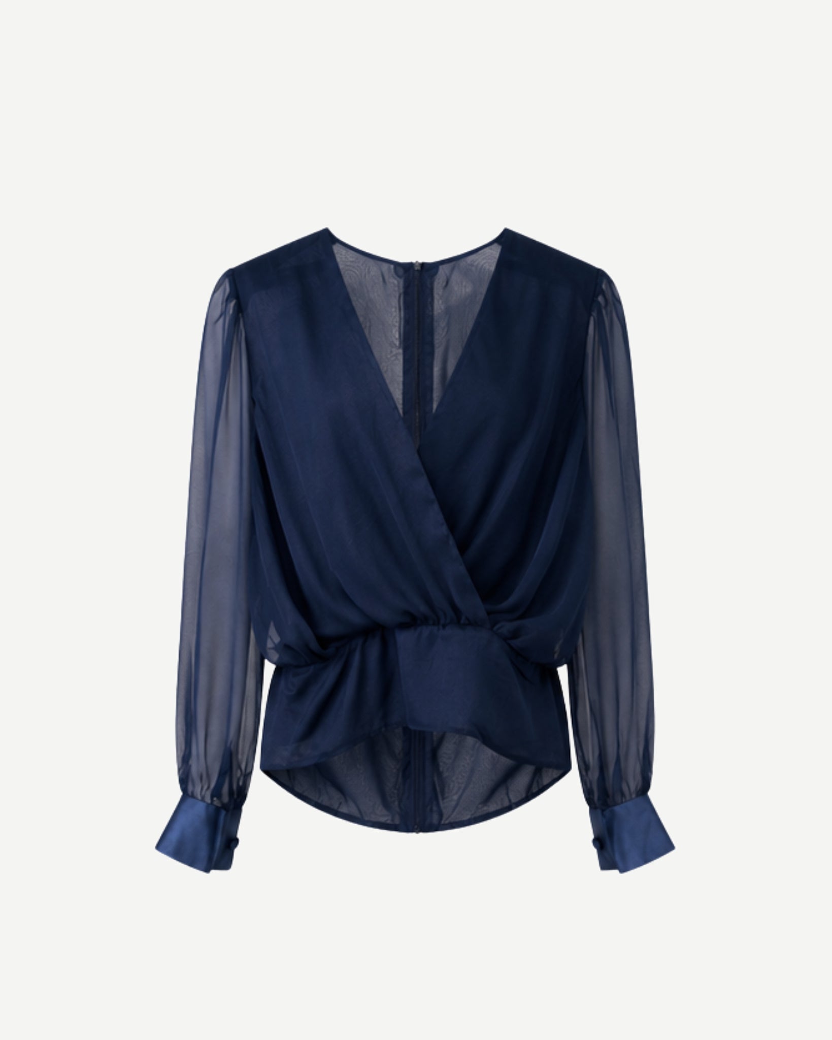 Front view of navy sheer wrap blouse with deep V neckline, gathered waist, and satin cuffs