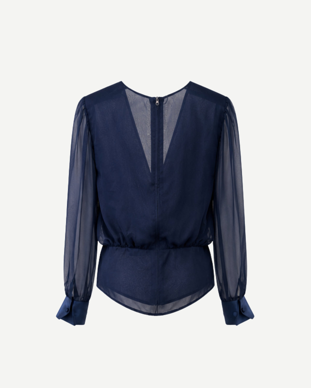 Back view of navy sheer chiffon blouse with center-back zipper and curved peplum hem