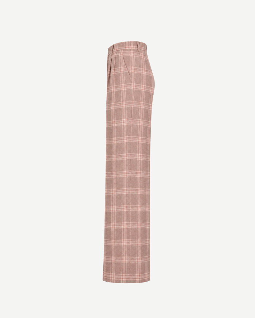 High-waisted tailored trousers in a muted pink and cream plaid pattern with a straight-leg cut and pocket detail at the side.