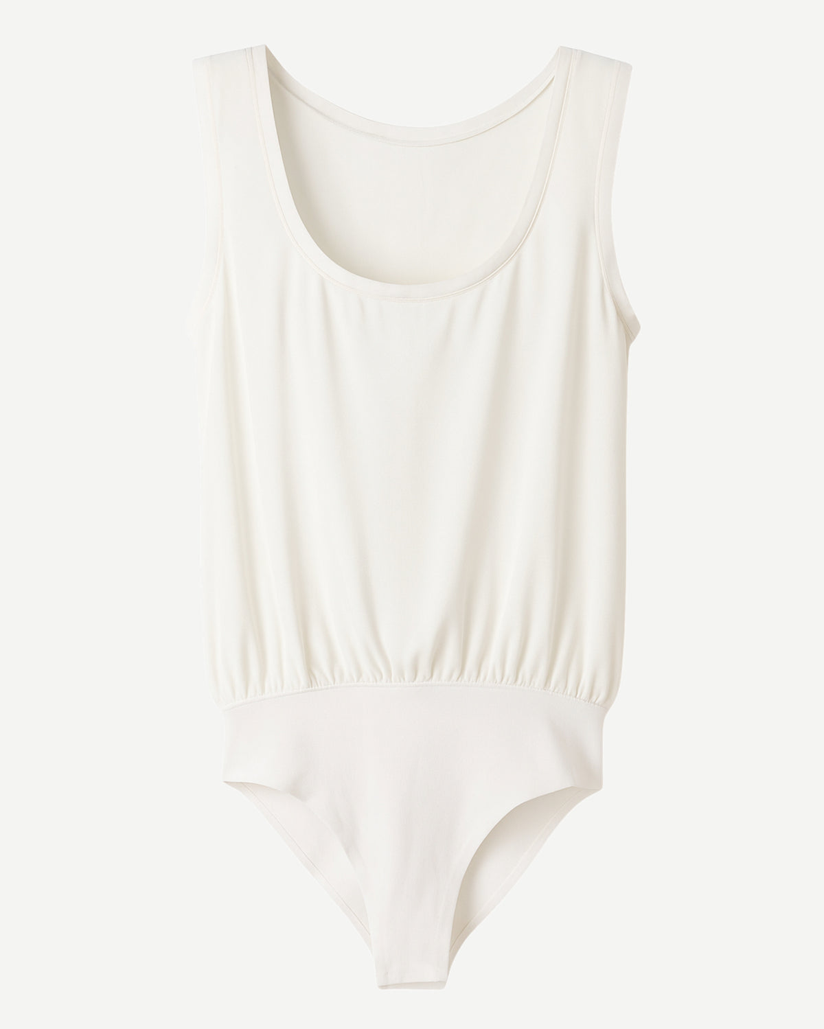 Front view of white silk crepe bodysuit with scoop neckline and elasticized waist
