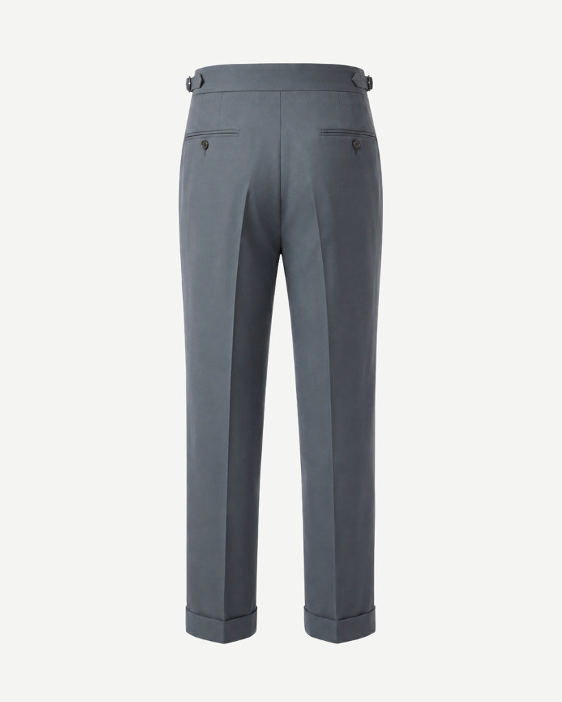 Back view of The Tailory Slate Grey Double-Pleat Wide-Leg Wool Trouser with back welt pockets, side adjusters, clean tailored back, and cuffed hem.