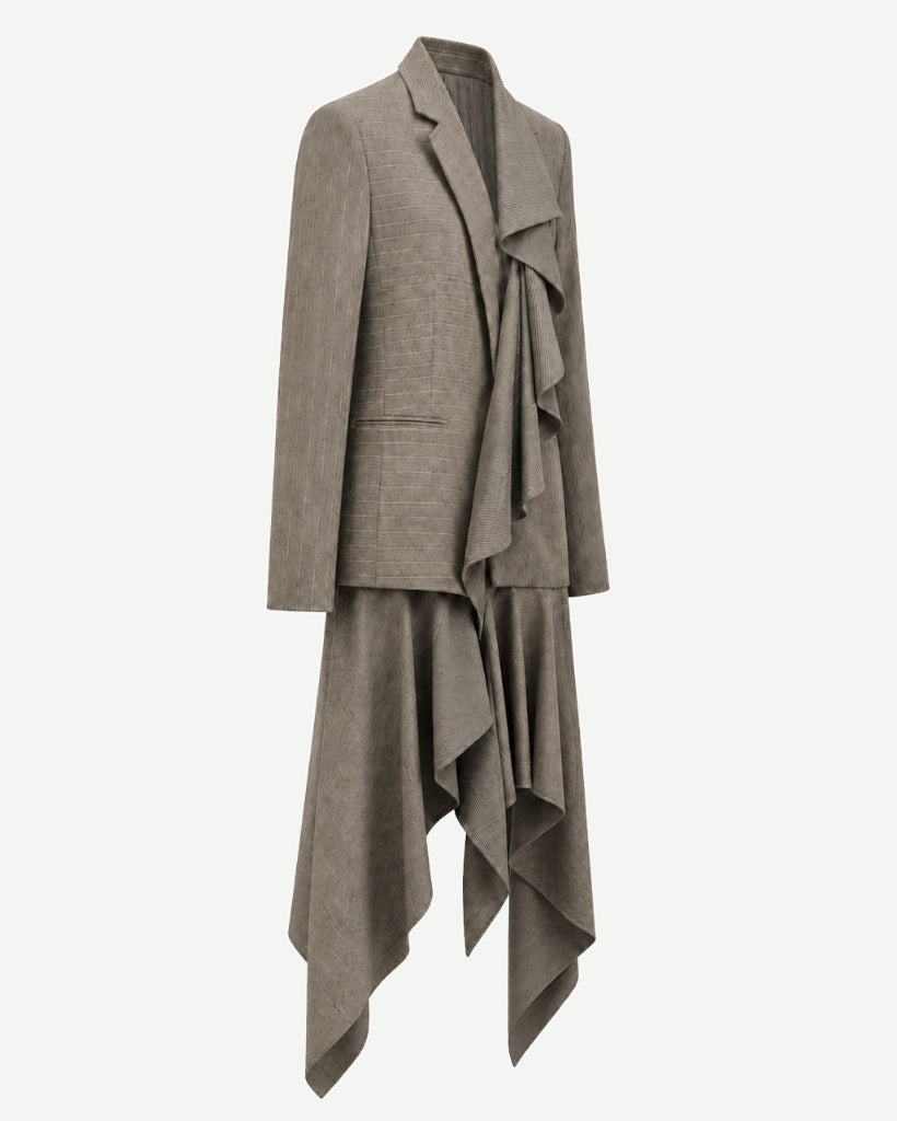 Left angled view of sculptural grey-taupe pinstripe tailored jacket showing the side profile, asymmetric front drape, long sleeve, welt pocket, and extended draped hem.