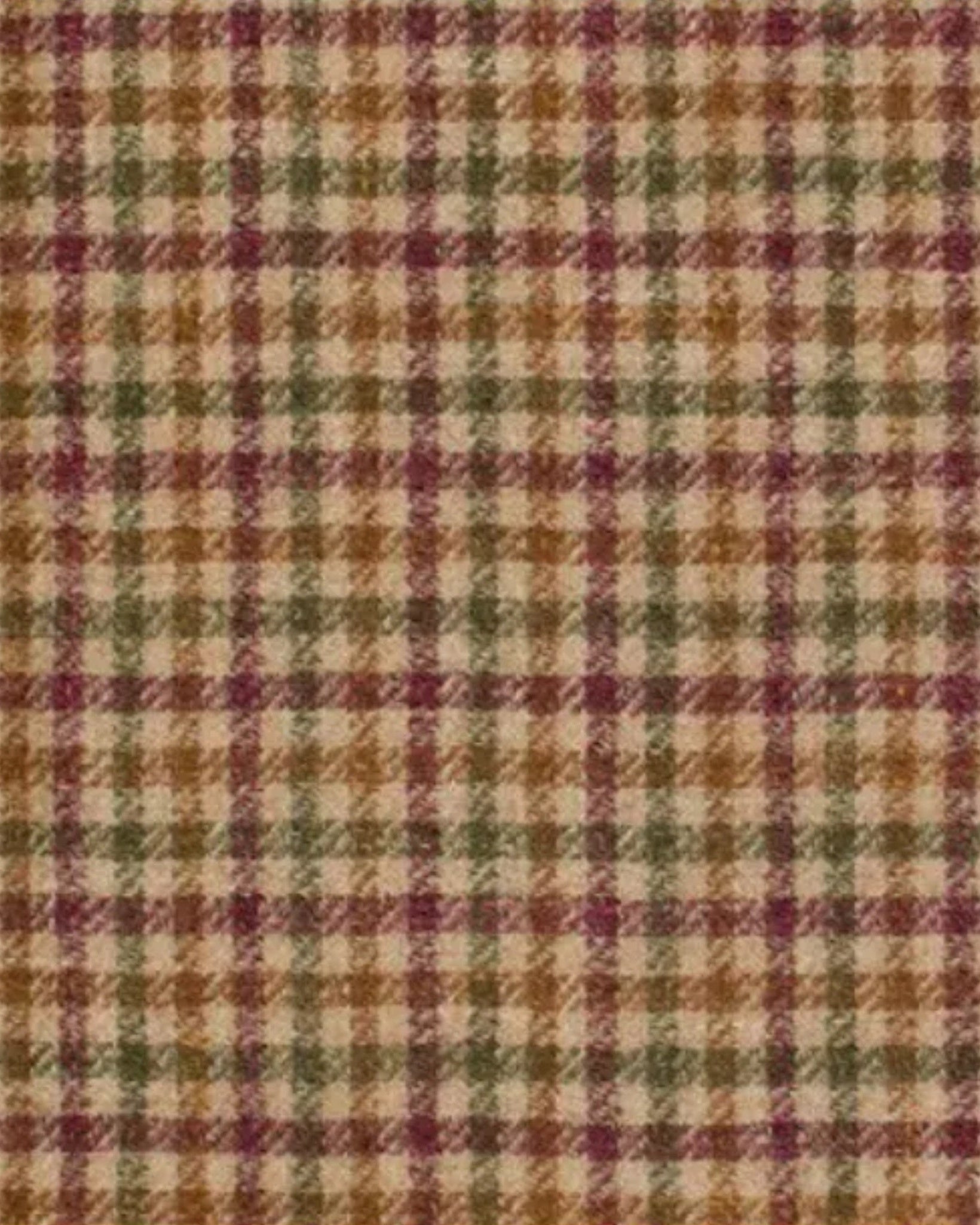 Close-up of soft wool fabric featuring a warm camel base with subtle plaid pattern in muted olive green, burgundy, and golden brown, highlighting the texture of the Camel Bomber Jacket | Custom Plaid Hybrid Blazer.