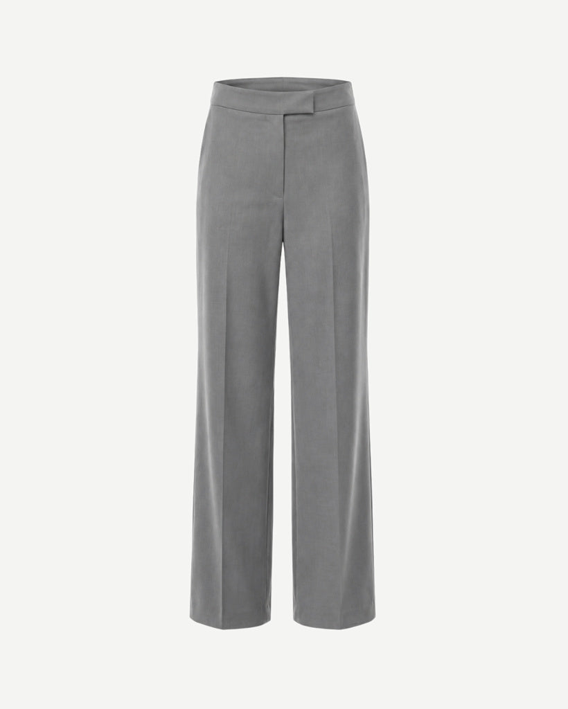 Front view of The Dailies Wide-Leg Trouser in grey suiting fabric with a clean waistband, concealed front closure, pressed crease, and wide-leg silhouette.