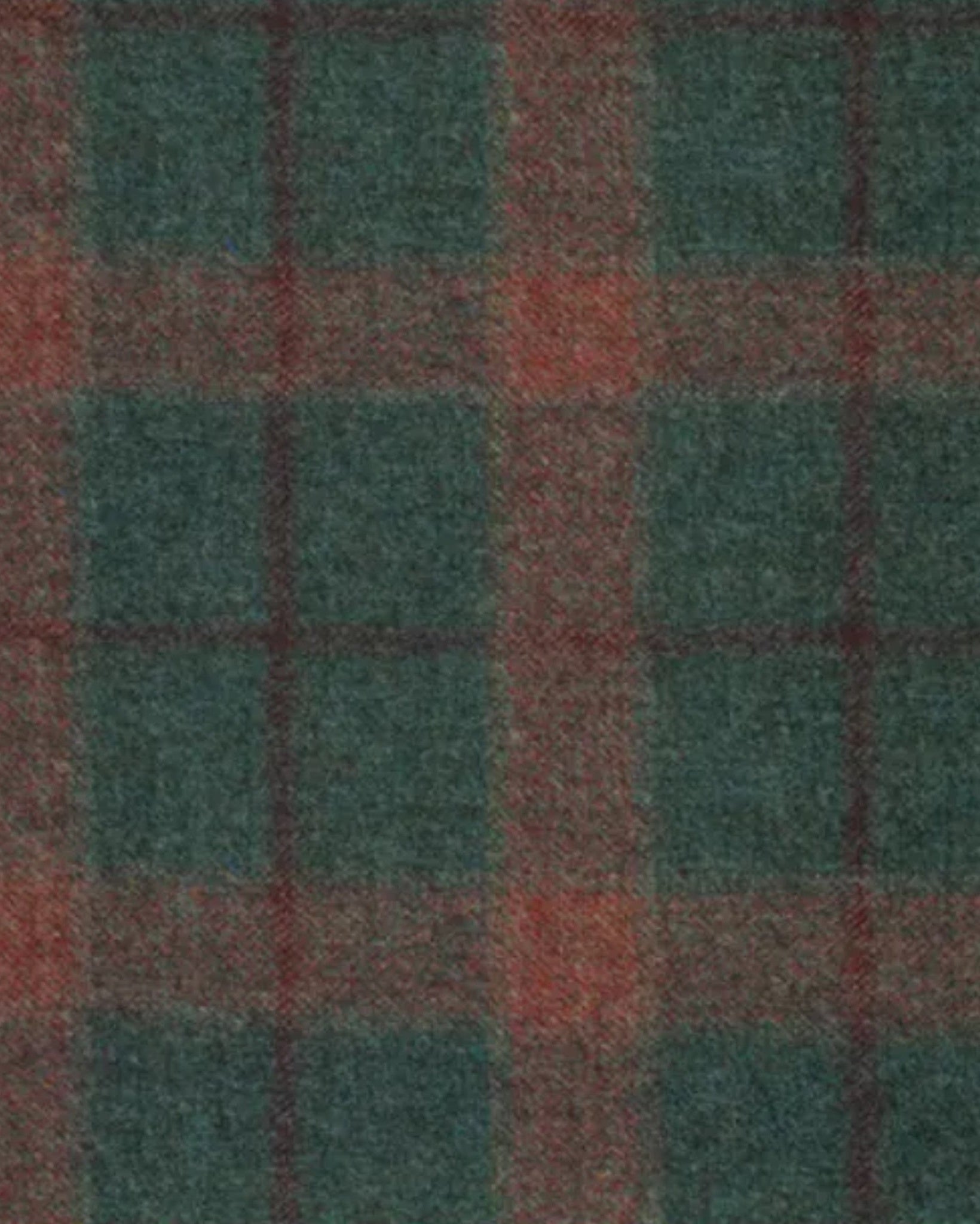 Close-up of textured fabric in muted forest green and deep rust tones, highlighting the plaid pattern of the Forest Green Sport Coat | Custom Double-Breasted Plaid, crafted for refined tailoring.