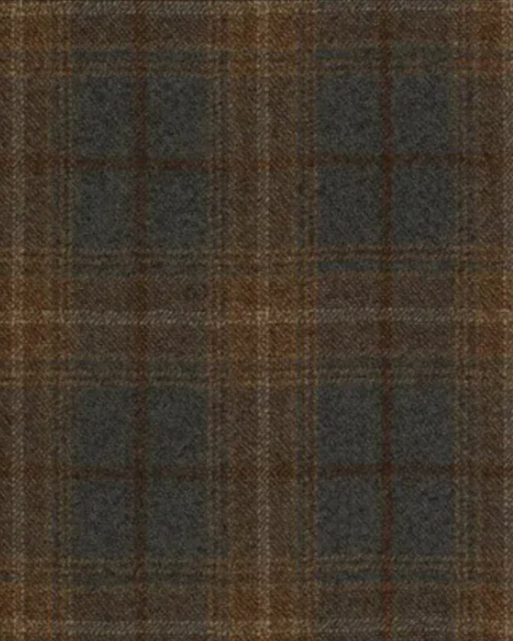 Close-up of soft wool fabric in muted shades of grey and tan with a subtle plaid pattern, highlighting the refined texture of the Grey Tan Sport Coat | Unstructured Blazer | Hand-Finished Details.