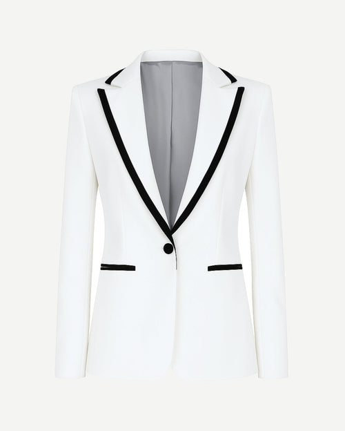 White Tuxedo Blazer with Contrast Piping featuring a slim tailored fit, black contrast piping along the notch lapels and pockets, single-button closure, and smooth grey interior lining for elegant formalwear.