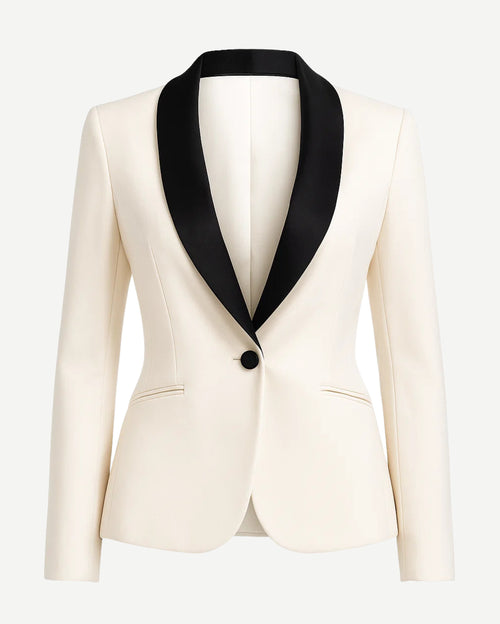 White blazer with black lapels on a white background