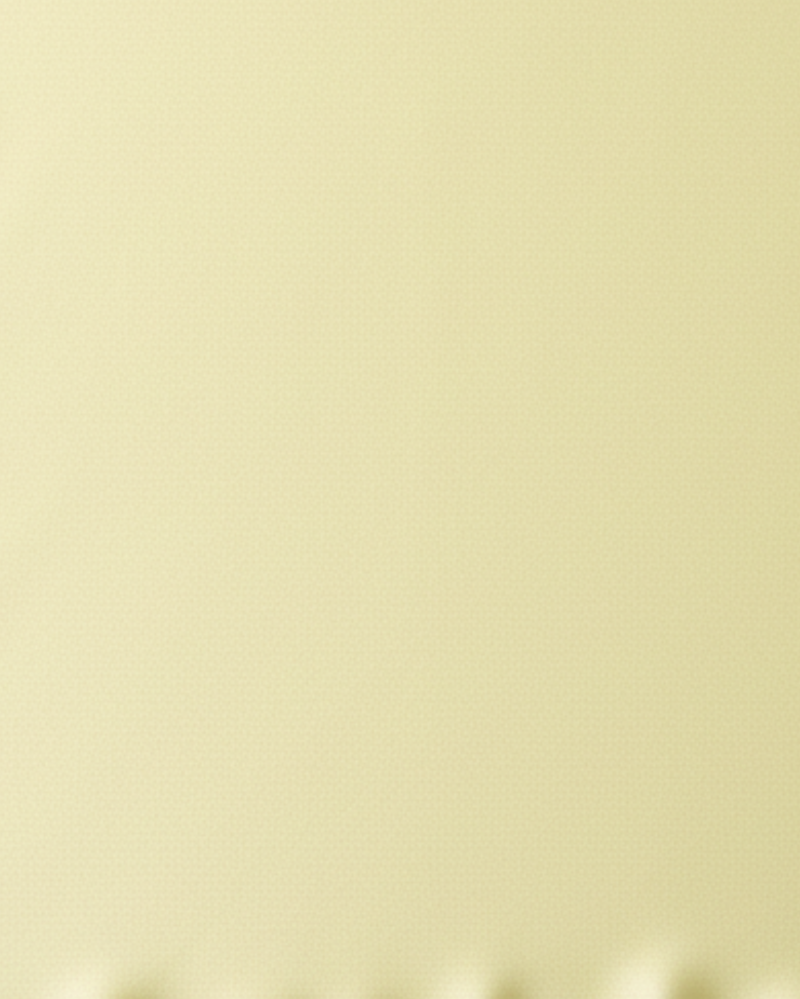 Close-up swatch of yellow satin fabric used for the cami tank top
